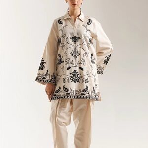 Pakistani shalwar kameez. Ethnic brand. Embroidered Cream and Black Women's Top